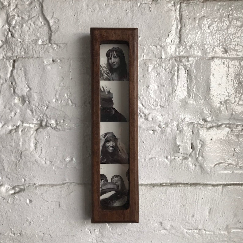 Solid walnut wood magnetic photo frame, suitable for 1.5 x 8 inch photo booth strip frames.