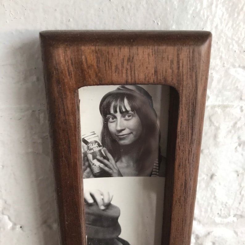 Solid walnut wood magnetic photo frame, suitable for 1.5 x 8 inch photo booth strip frames.