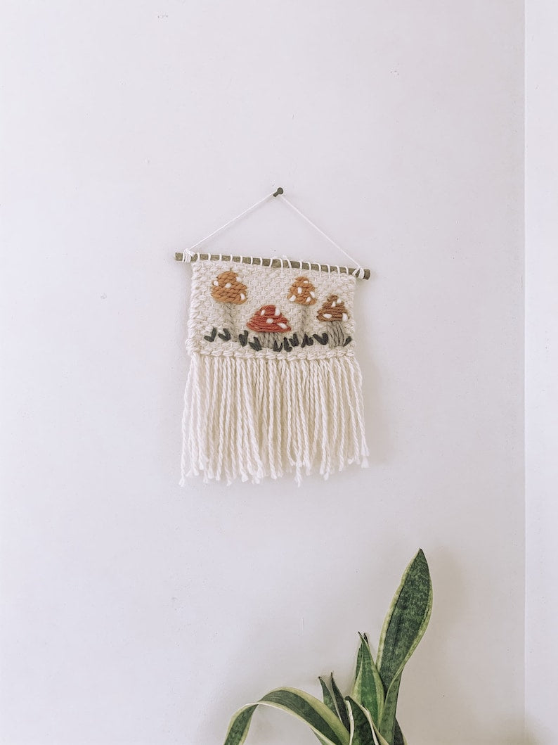 Woven wall hanging with bohemian mushroom embroidery, unisex style decoration