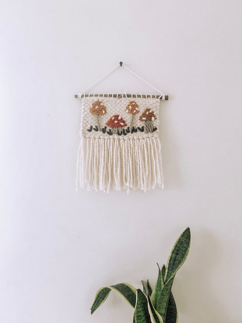 Woven wall hanging with bohemian mushroom embroidery, unisex style decoration