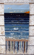 Hand-woven tapestry, sunrise over the sea, abstract coastal tapestry