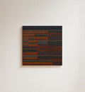 Colorful geometric square pattern, matte surface.