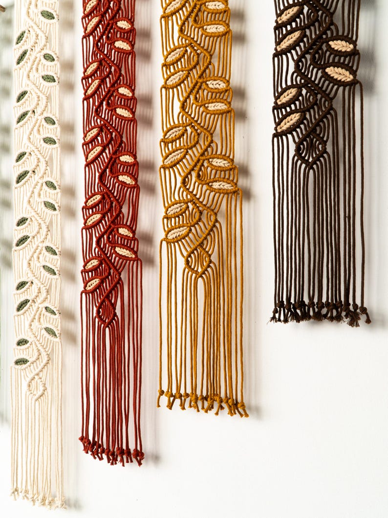 Hand-woven tapestry - Bohemian-style leaf yarn artwork.