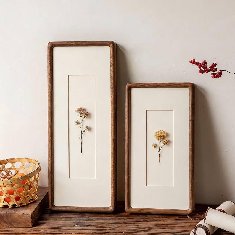 Narrow solid walnut and teak frames, suitable for photo strips, tickets, embossed designs, etc.
