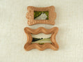 Handcrafted wooden picture frame, with a wavy, irregularly carved dog bone frame, suitable for wall or table decoration.